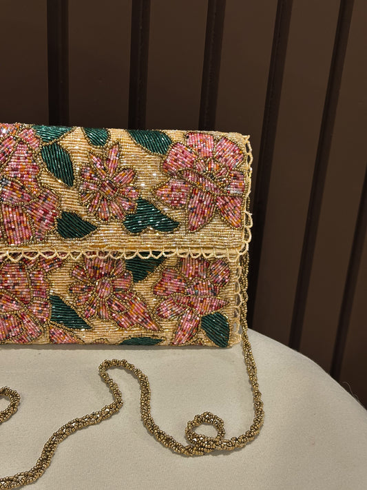 Peach floral mini shoulder bag for girls with chain strap by Amal Ayub