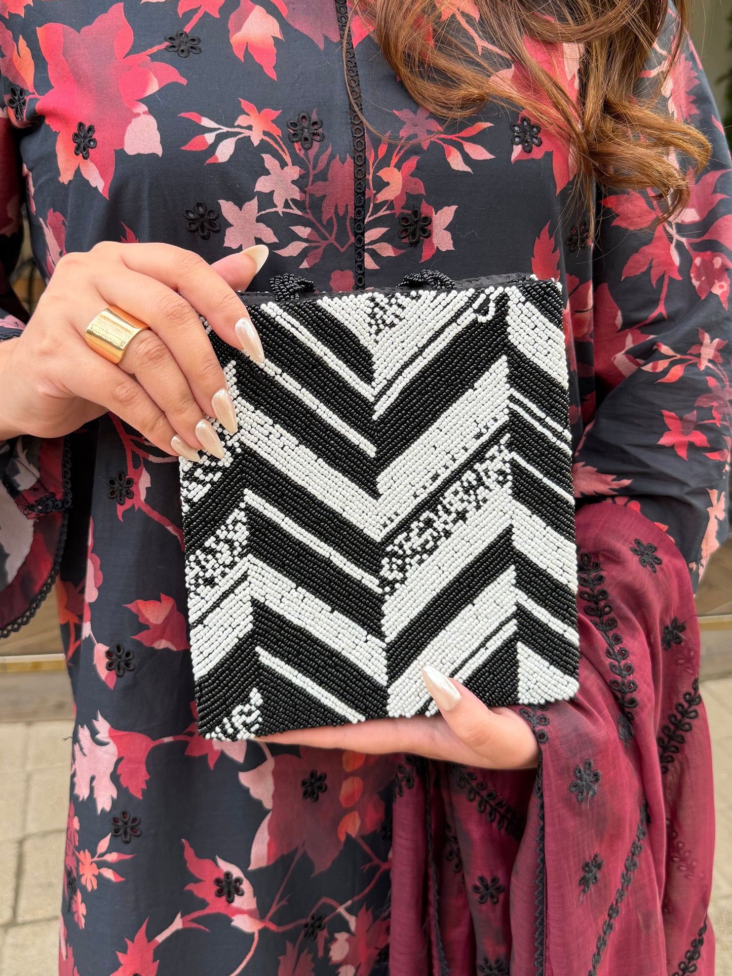 Black and white beaded designer clutch