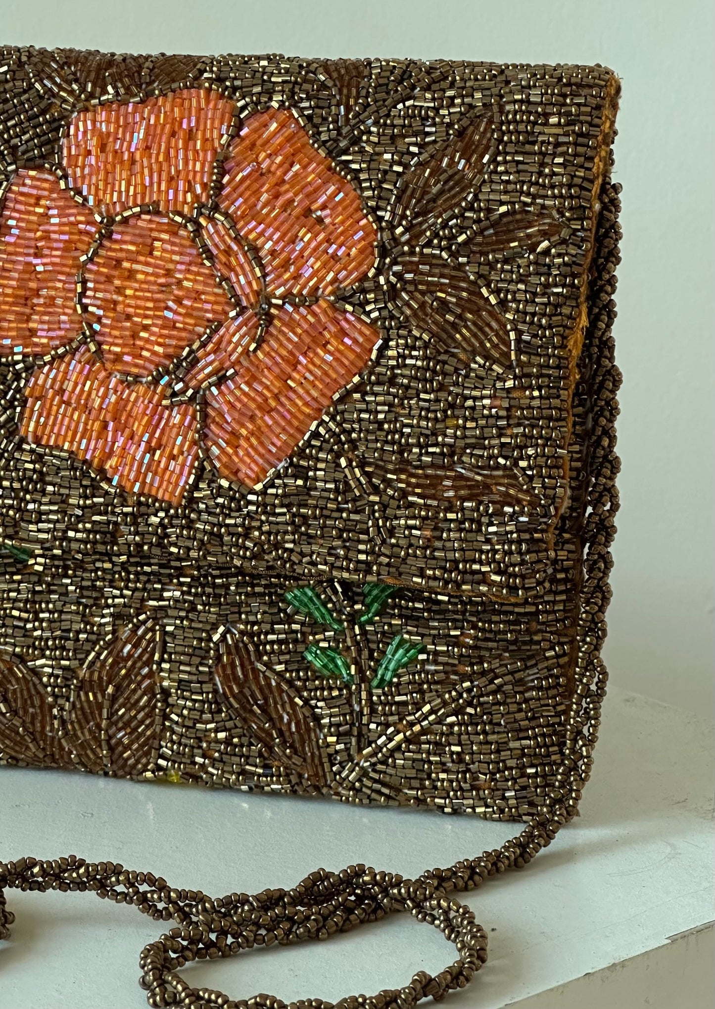 Copper motif embellished handbag