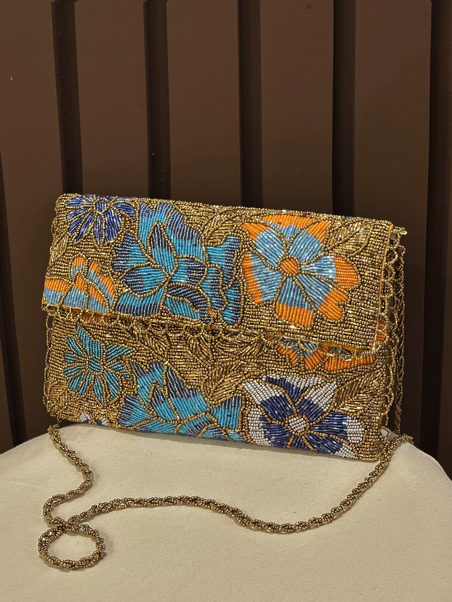 Gold Hand embellished clutch