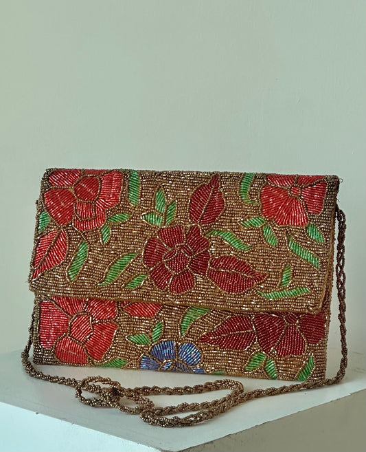 Handcrafted bronze beaded flap clutch purse with red floral motif embroidery and braided strap - Designer Accessories by Amal Ayub
