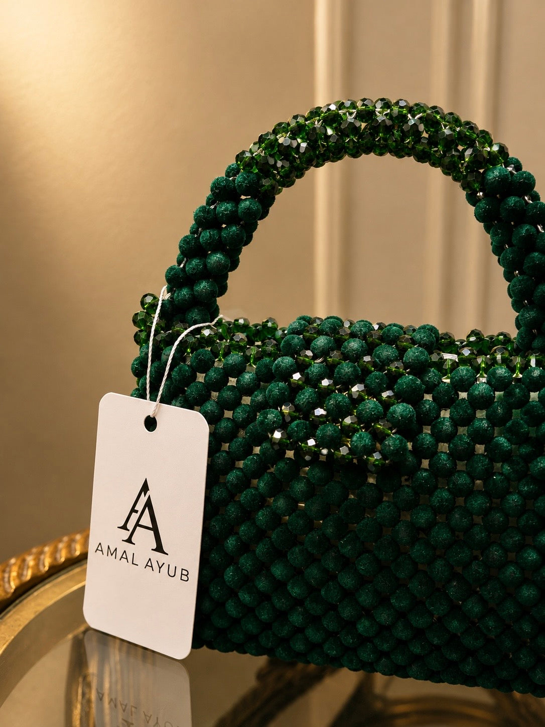 Handcrafted emerald green crystal beaded handbag with top handle by Amal Ayub