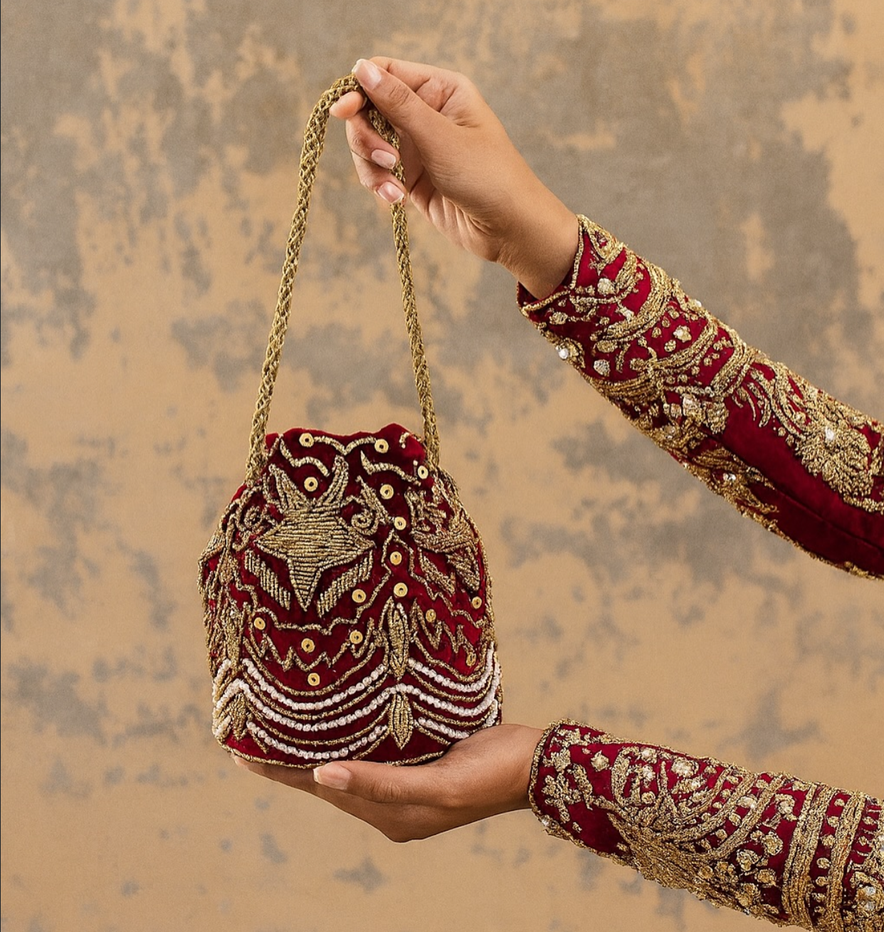 Red embellished potli wedding