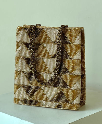Gold copper geometric beaded clutch