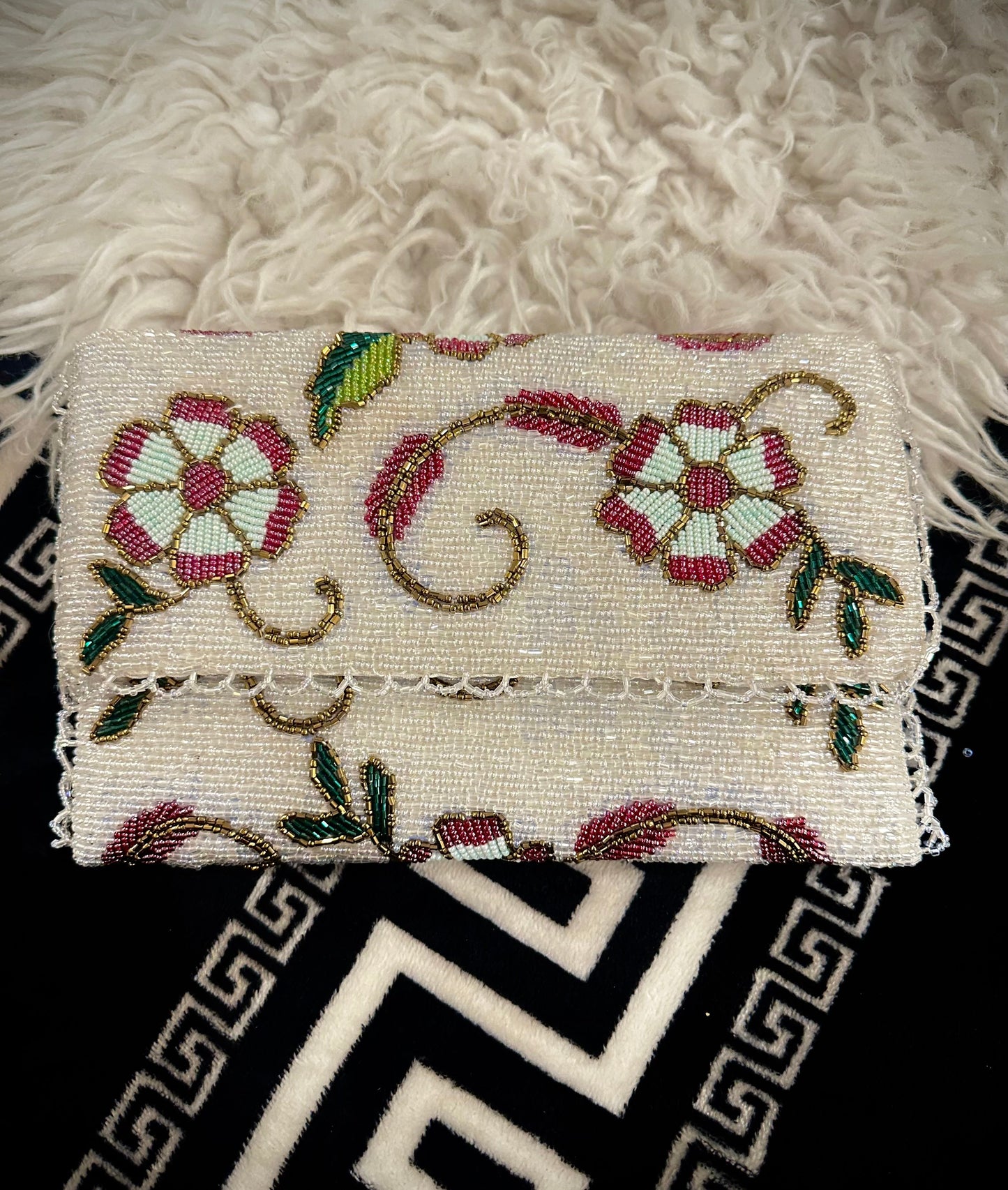 White Hand beaded clutch with Floral and leaf detailings