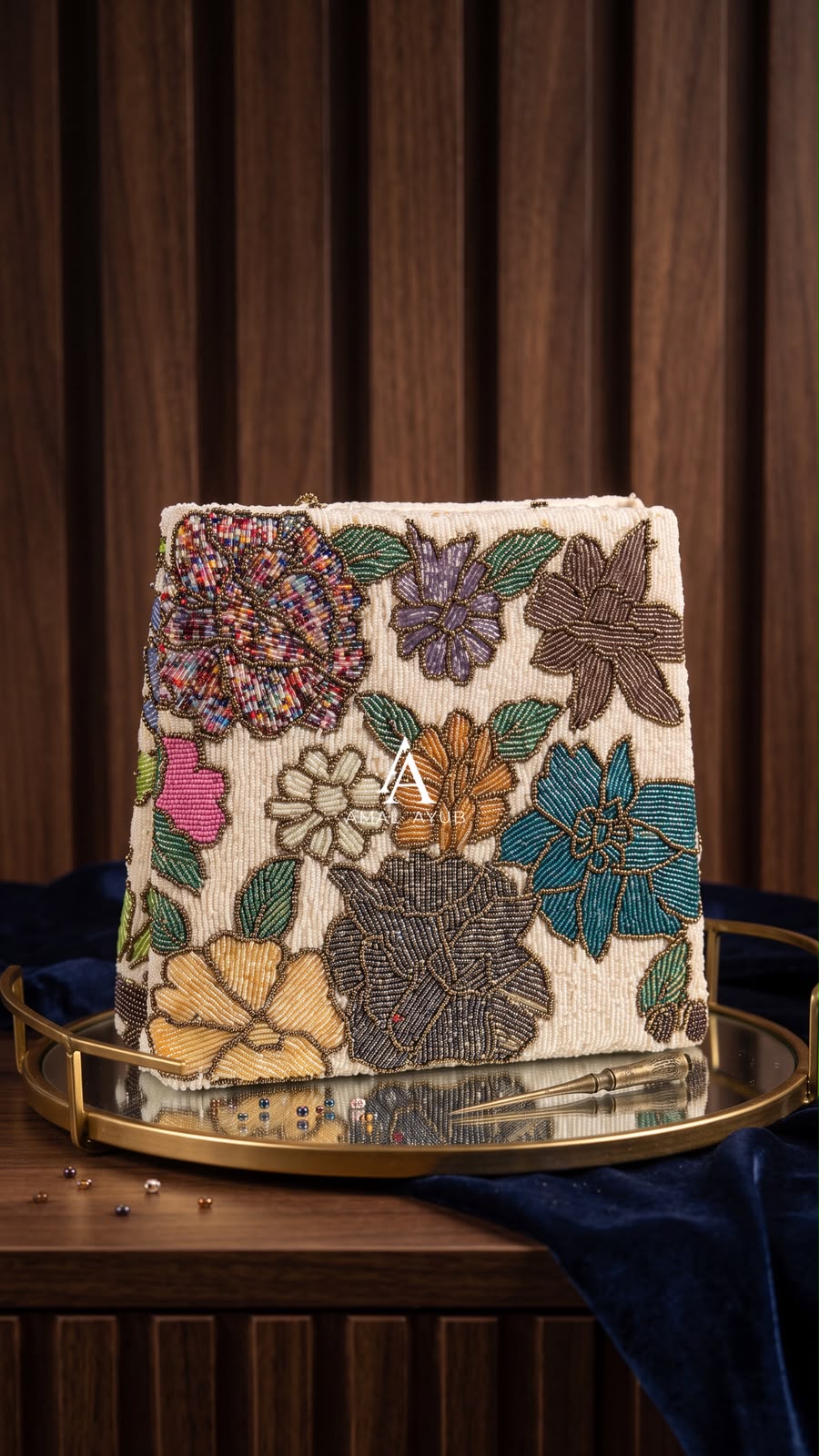 Amal Ayub cream hand-embellished box handbag with multicolor floral beadwork and gold clasp