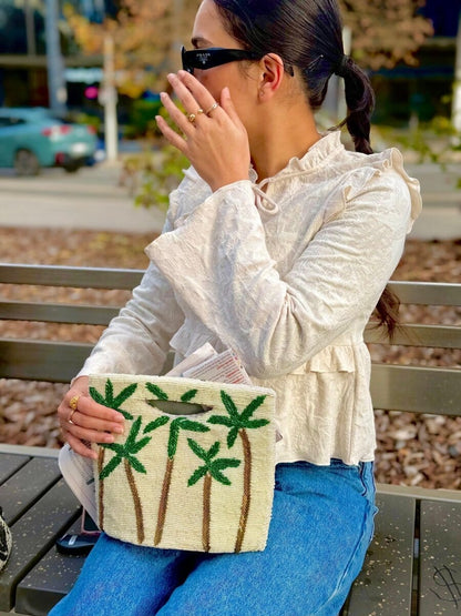 Beige tropical leaf embellished bag hand embellished bag Amal Ayub 