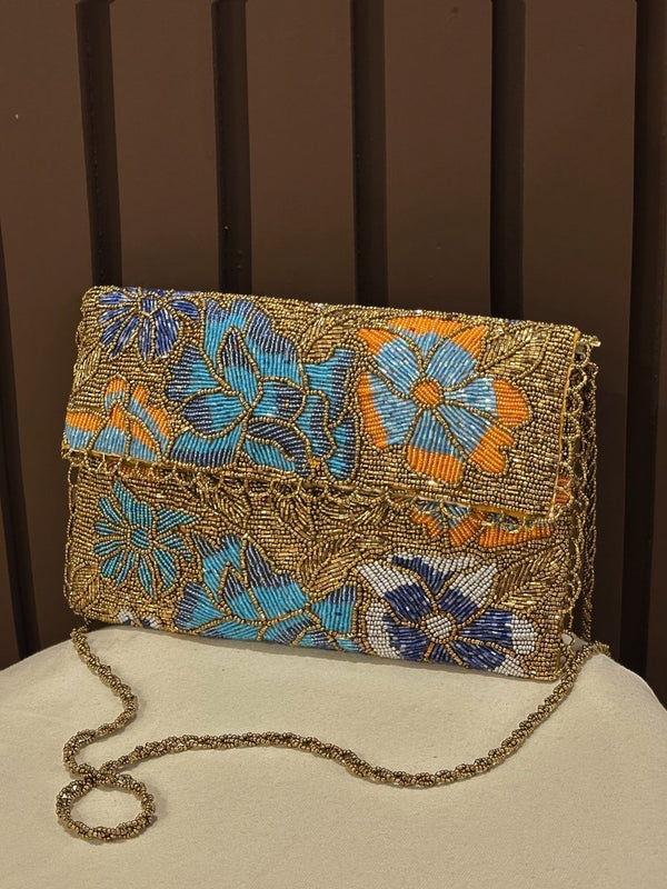 Gold and blue hand-embellished floral clutch bag