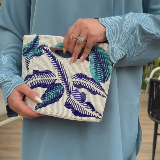 Amalayub elegant blue modest dress with handcrafted beaded clutch