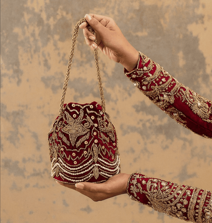 Red embellished potli wedding hand embellished bag Amal Ayub 