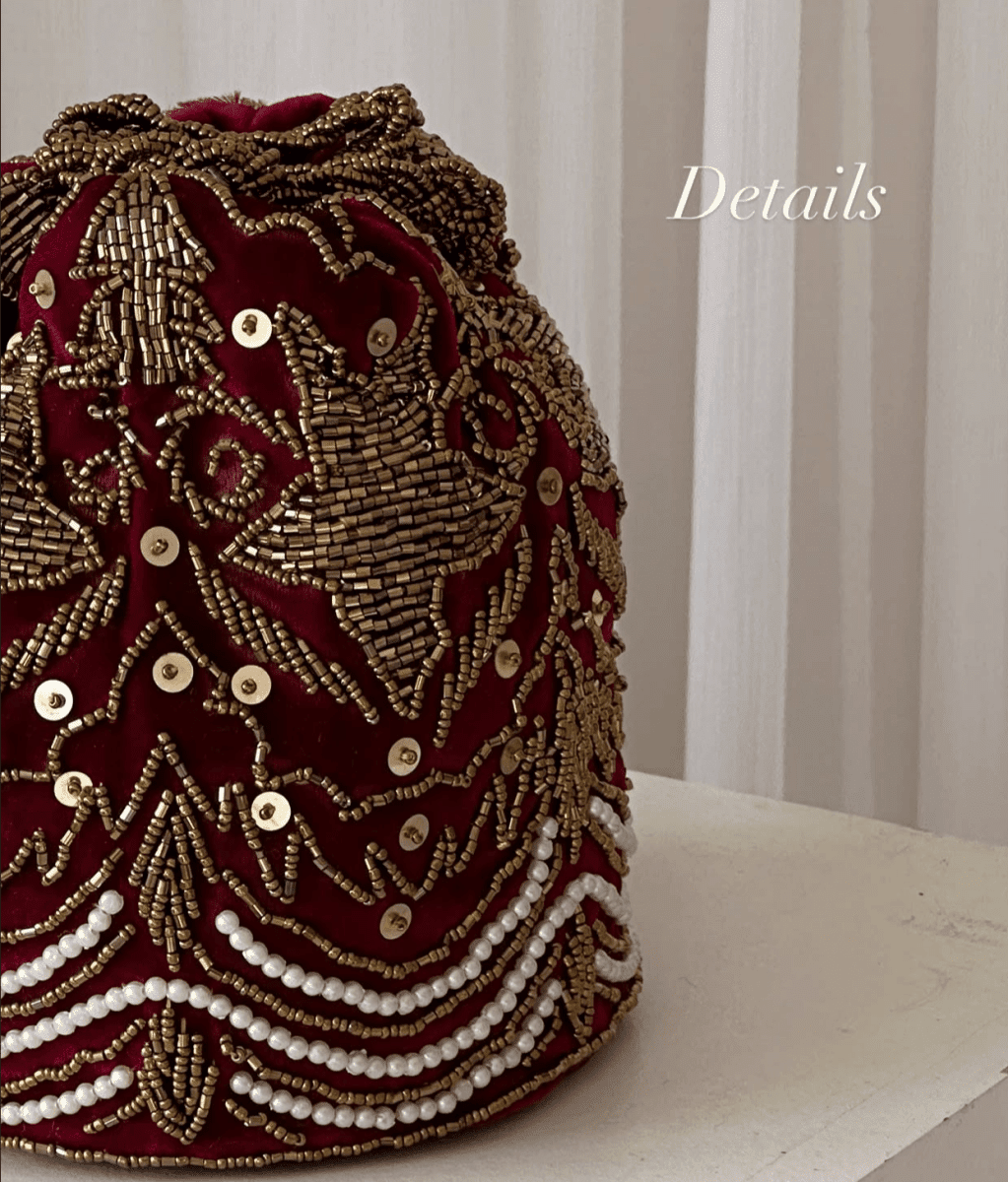 Red embellished potli wedding hand embellished bag Amal Ayub 