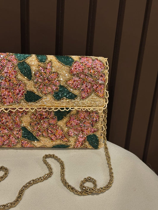 Peach floral mini shoulder bag for girls with chain strap by Amal Ayub