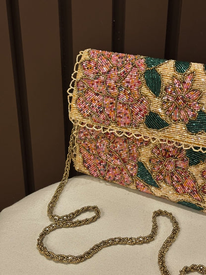 Peach floral mini shoulder bag for girls with chain strap by Amal Ayub
