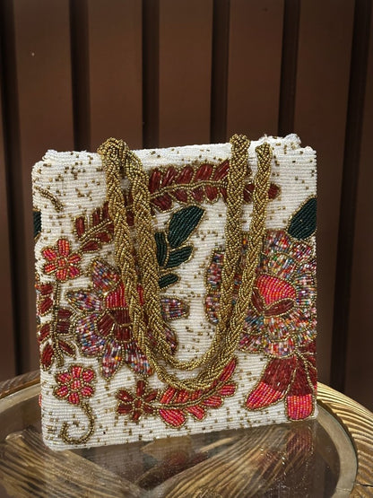 White floral hand embellished handbag - Amal Ayub
