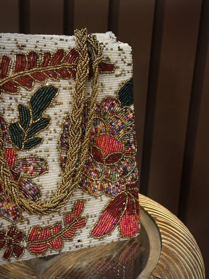 White floral hand embellished handbag - Amal Ayub